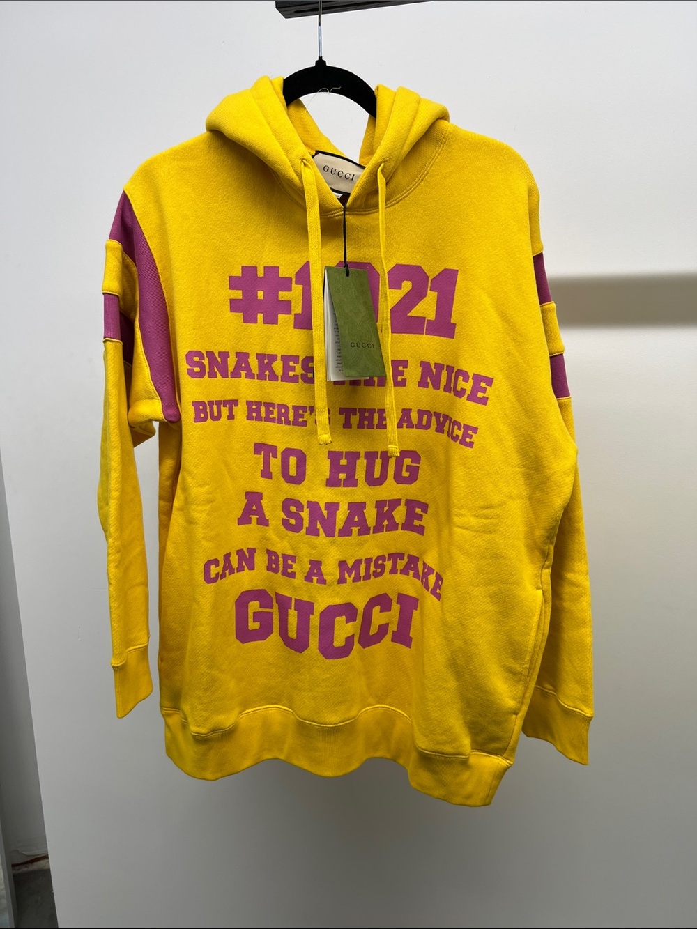 NWT Gucci yellow hoodie with pink graphic text